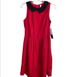 Red dress with beaded collar.